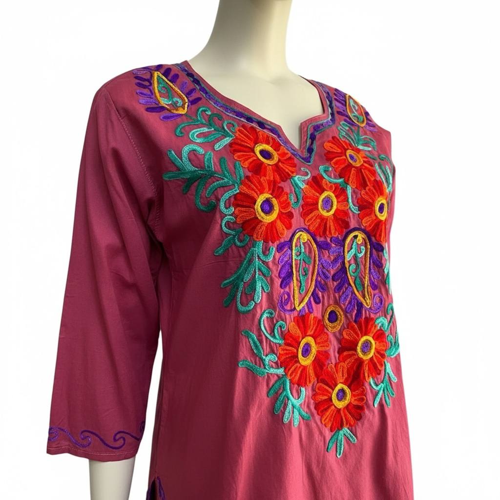 Blusa artesanal magenta tejida a mano