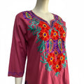 Blusa artesanal magenta tejida a mano