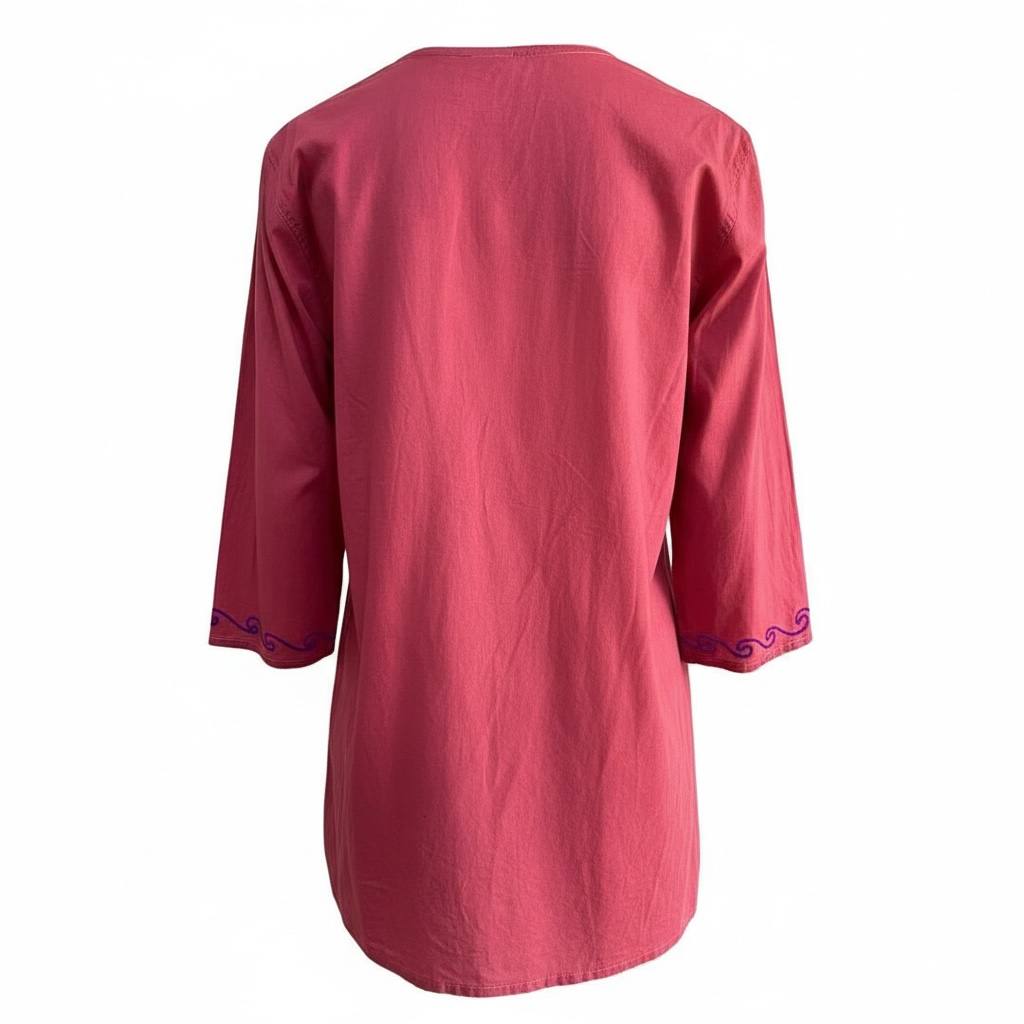 Blusa artesanal magenta tejida a mano