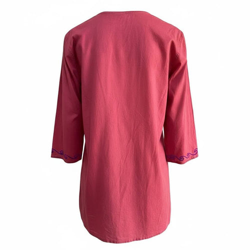 Blusa artesanal magenta tejida a mano
