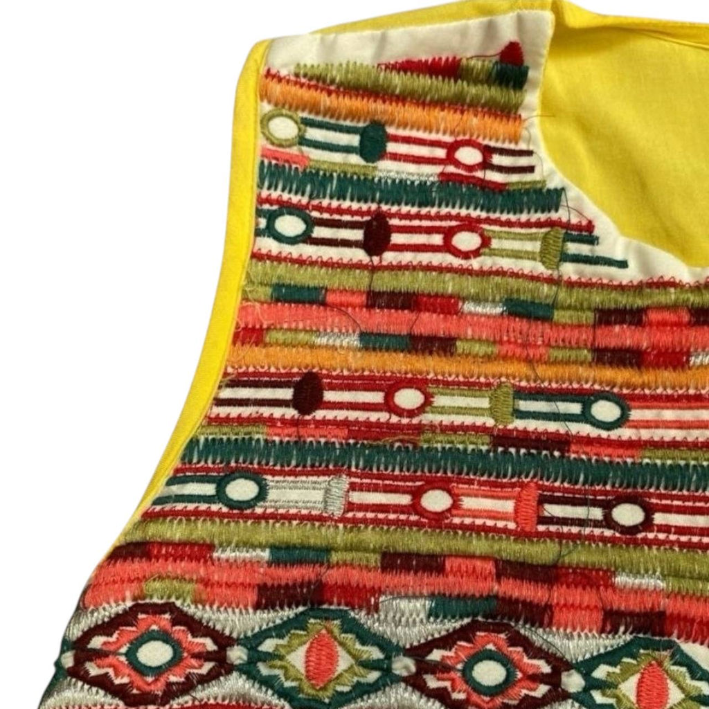 Blusa intervenida con tejido tradicional a mano estilo Wayuu