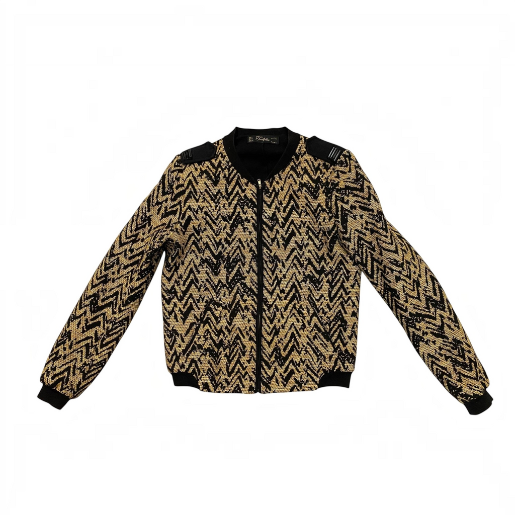 Chaqueta bomber Zara Trafaluc de civbclo en color negro y dorado con estampado geométrico en zigzag y cierre frontal