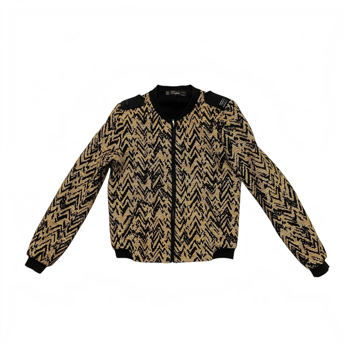 Chaqueta bomber Zara Trafaluc de civbclo en color negro y dorado con estampado geométrico en zigzag y cierre frontal
