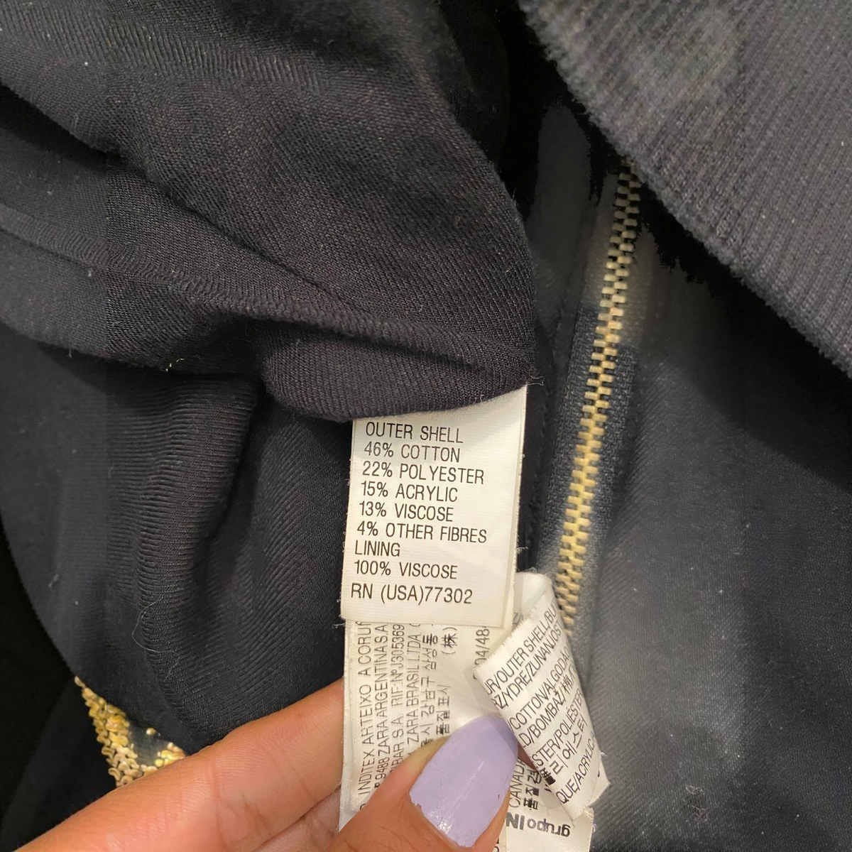 Etiqueta de composición de chaqueta Zara Trafaluc de civbclo mostrando mezcla de algodón y forro de viscosa