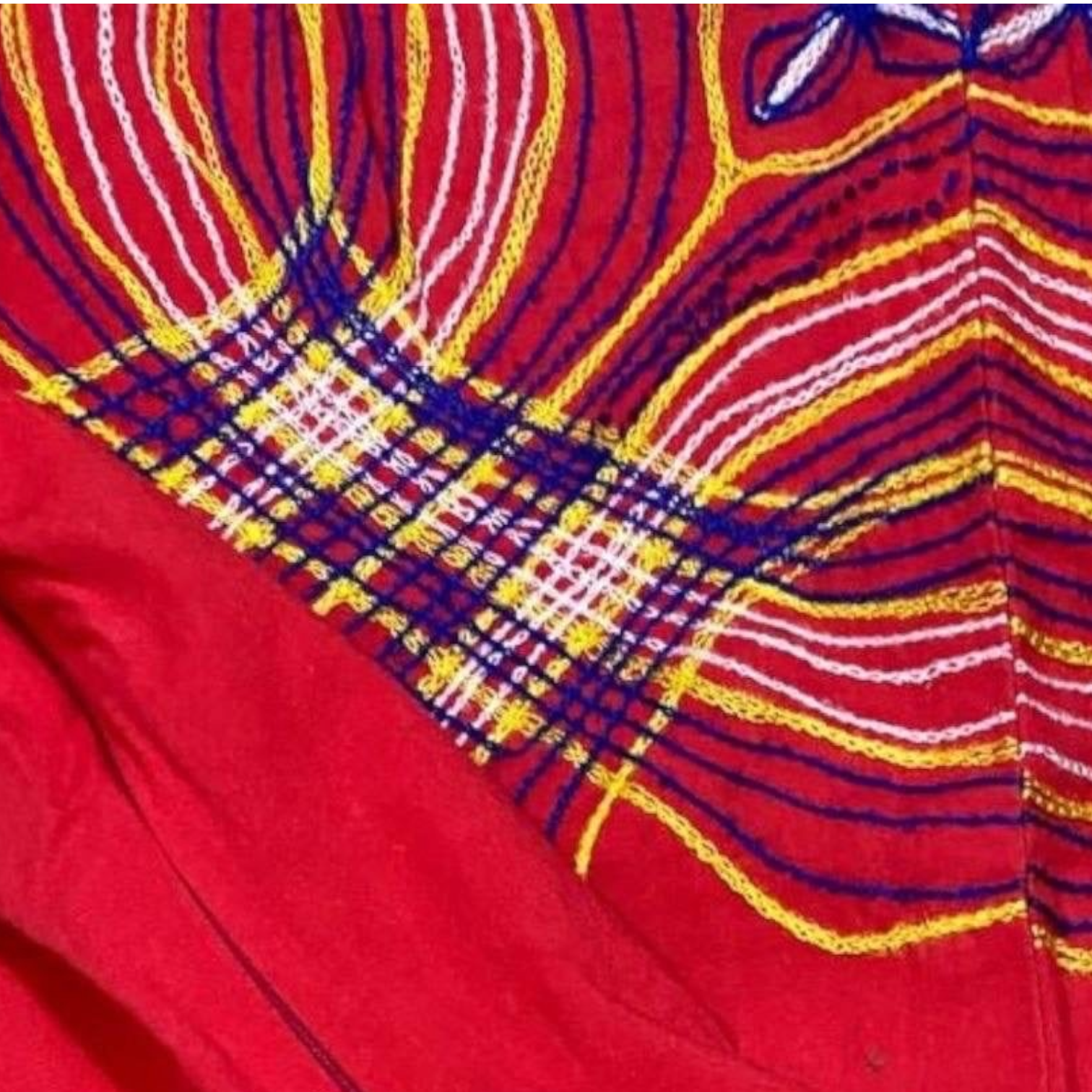Blusa bordada colores primarios
