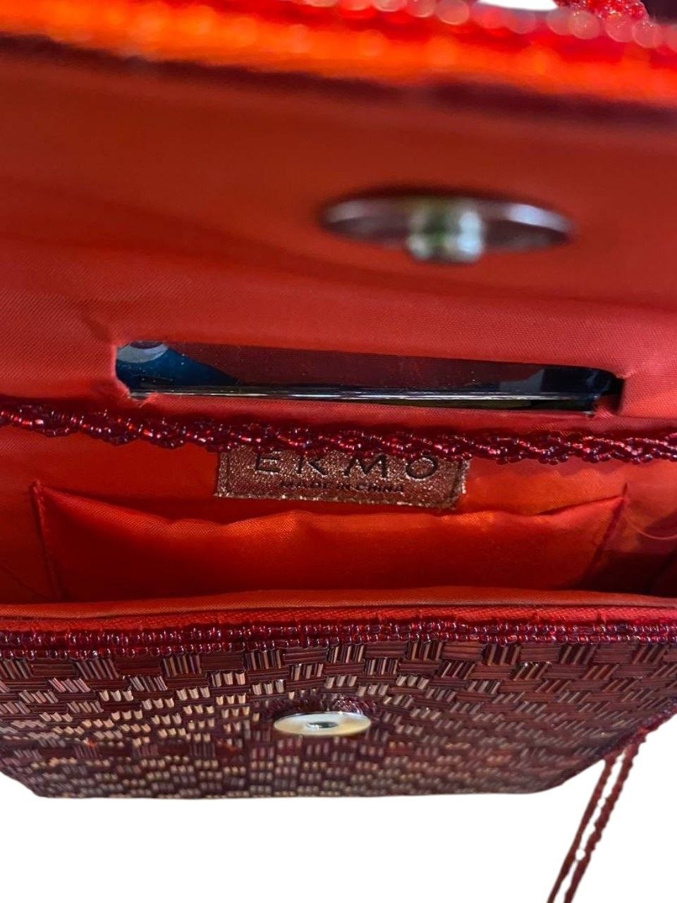 Bolso de mano textil con chaquira