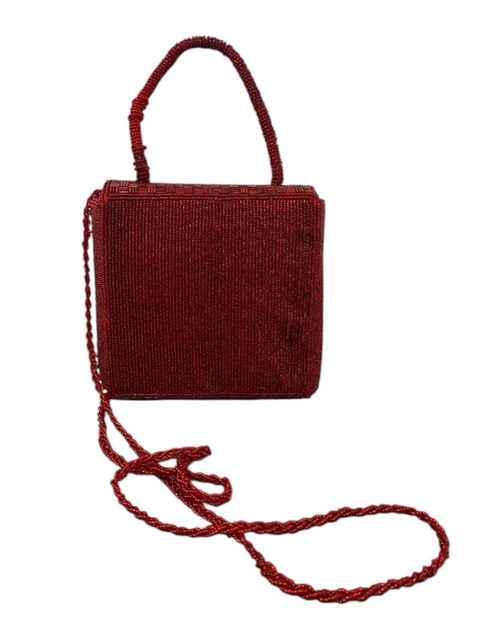 Bolso de mano textil con chaquira